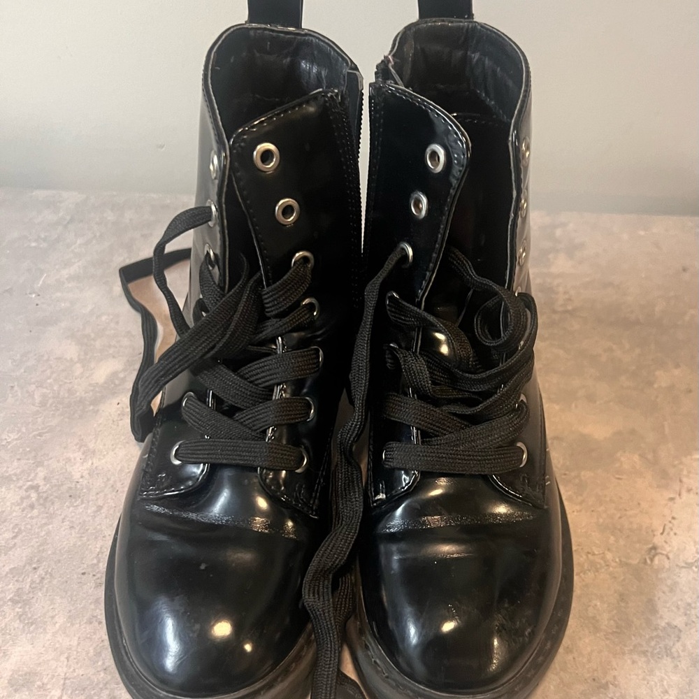 Almost new 12t kids boots with side zip retails 25 on Amazon.